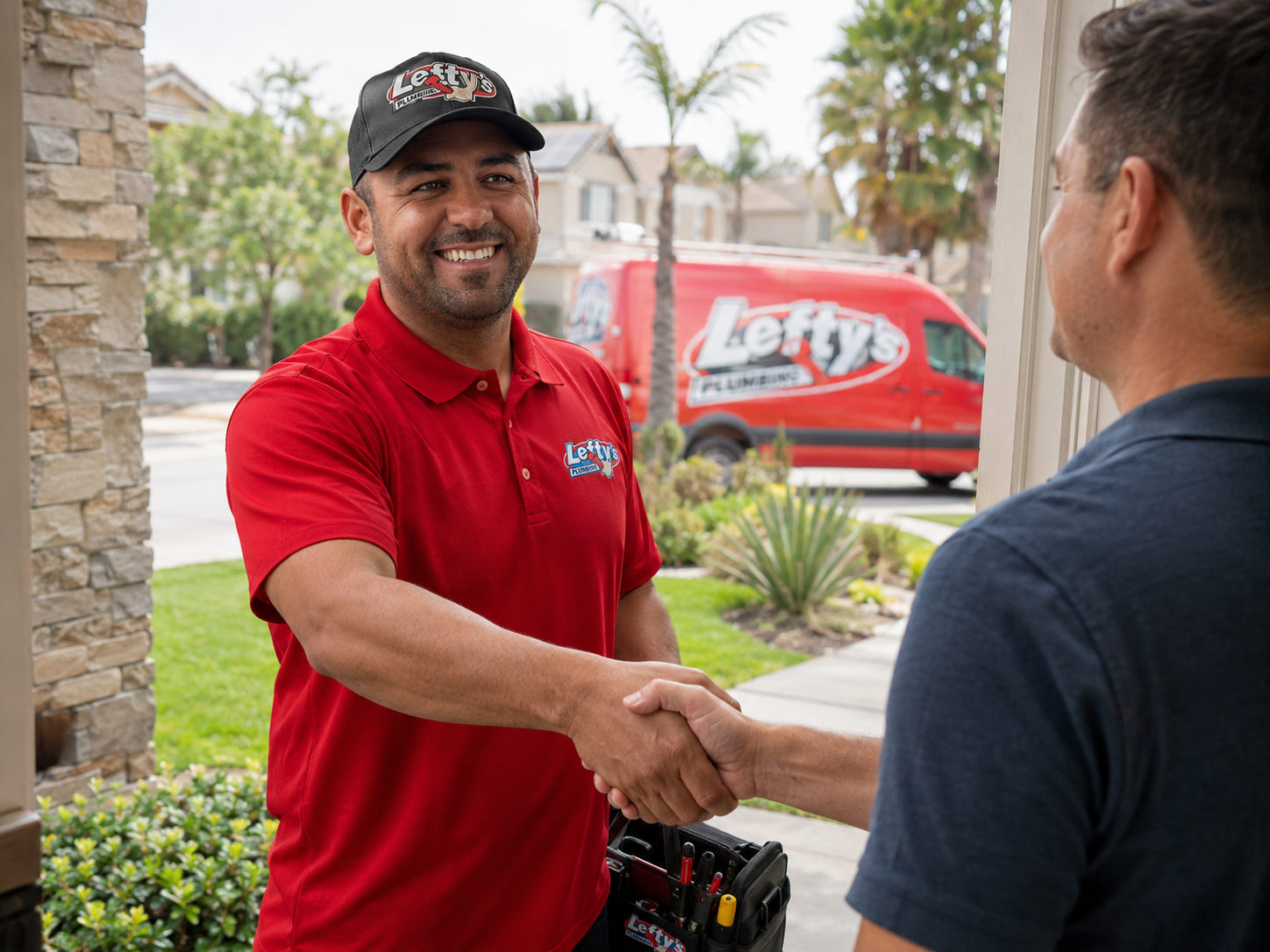 Rafael greeting a customer at the front door